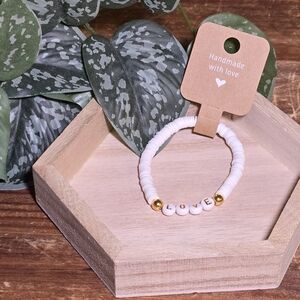 White Beaded Bracelet with Gold Accents